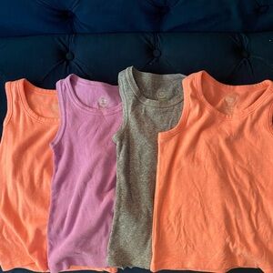 4 sleeveless shirts size 4/5 xs
